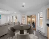 Dining room with recessed lighting, visible vents, baseboard heating, and wood finished floors