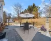 View of patio / terrace with outdoor dining space and an outdoor structure