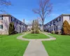 View of home's community featuring a residential view and a yard