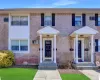 View of front of house featuring brick siding