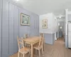 Dining area featuring light tile patterned floors and crown molding