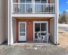 Entrance to property featuring a balcony