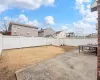 View of yard featuring a storage shed, a fenced backyard, an outdoor structure, and a patio