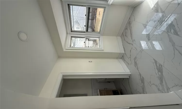 Stairway with visible vents, baseboards, wood finished floors, a fireplace, and recessed lighting