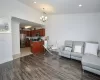 Kitchen featuring crown molding, visible vents, appliances with stainless steel finishes, a sink, and a peninsula