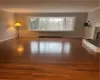 Formal Living Room with large bay window, Crown molding and hardwood floors