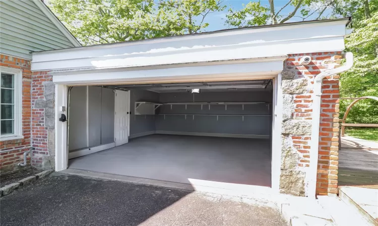 View of garage with an entrance to the family room.