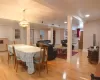 Dining room featuring light wood-style floors, recessed lighting, visible vents, and baseboards