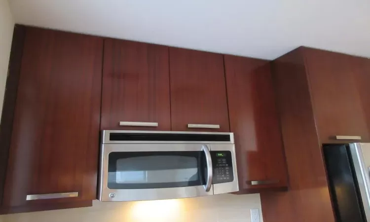 Kitchen featuring appliances with stainless steel finishes