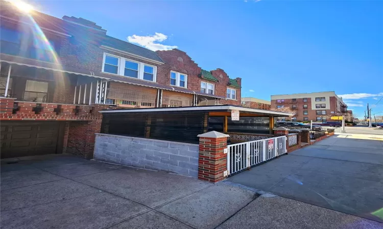 View of front of property with brick siding