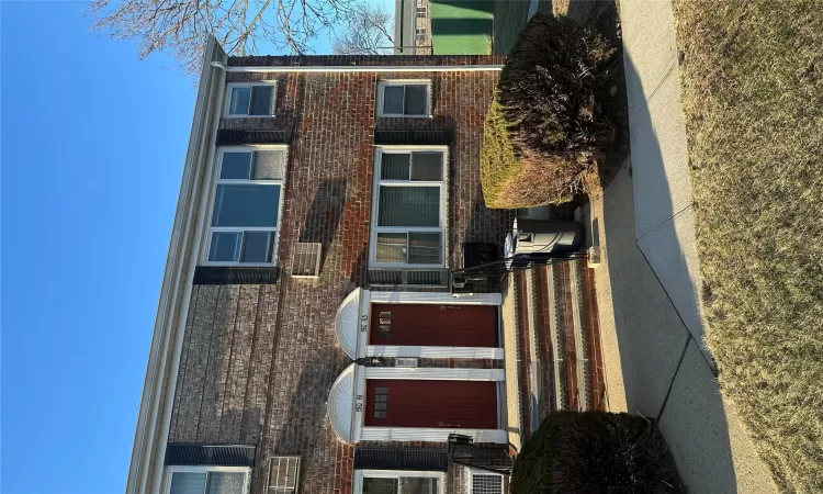 View of front facade with brick siding