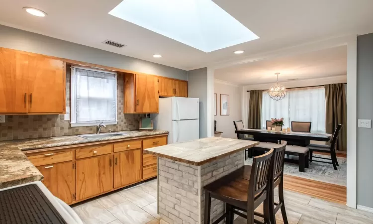 Island seating, beautiful skylight