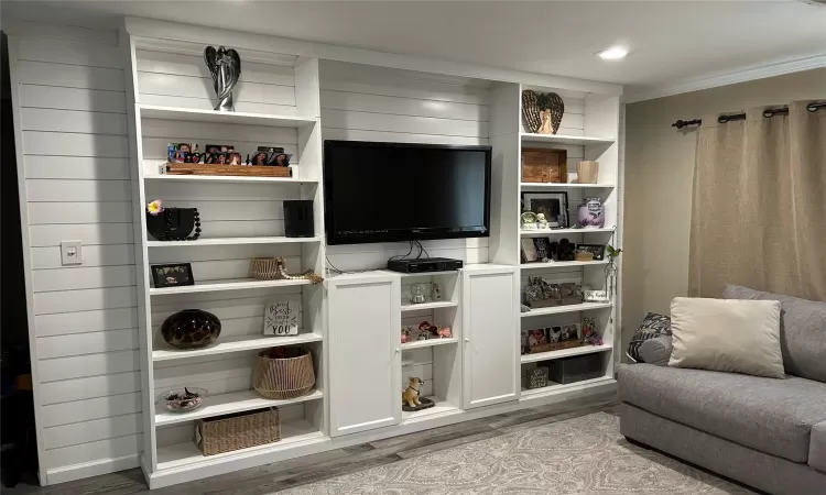 Living room featuring wood style finished floors