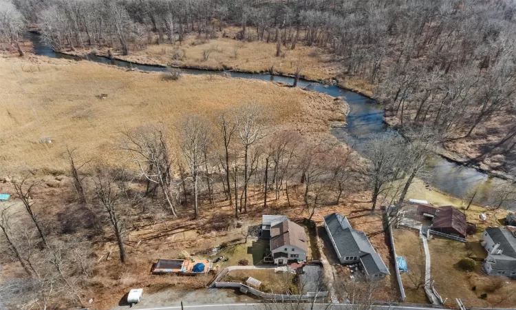 Aerial view featuring a water view of a stream that runs into Annsville Creek.