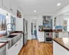 The kitchen leads to a small space which makes for the perfect home office.