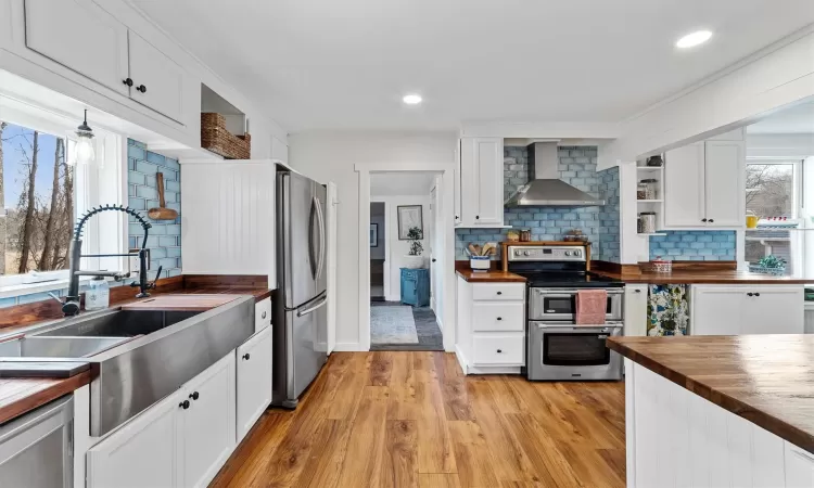 The kitchen leads to a small space which makes for the perfect home office.