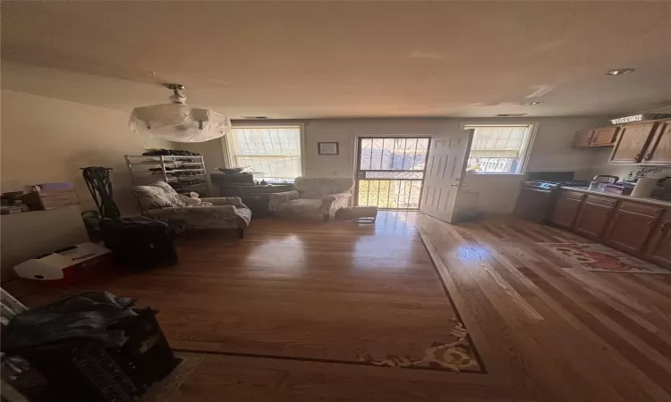 Living area featuring a wealth of natural light and wood finished floors