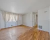 Unfurnished room with visible vents and light wood finished floors