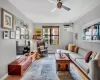 Living area featuring southern exposure, hardwood floors, thru the wall A/C.