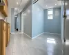 Basement featuring recessed lighting, baseboards, and light wood-style floors