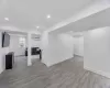 Carpeted bedroom featuring visible vents, baseboards, and vaulted ceiling