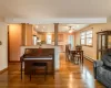 Sunroom featuring lofted ceiling with skylight