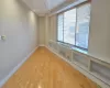 Spare room with light wood-type flooring and baseboards