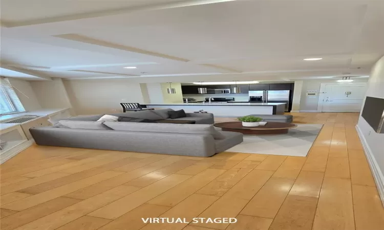 AI-Living room featuring light wood-style flooring