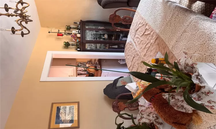 Bedroom featuring a notable chandelier