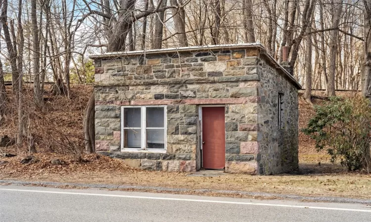 View of outdoor structure featuring an outdoor structure