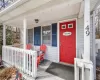 Property entrance with covered porch