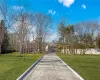 View of street featuring driveway