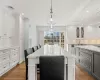 Dining space with visible vents, recessed lighting, and wood finished floors