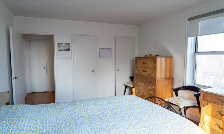 Bedroom with wood finished floors