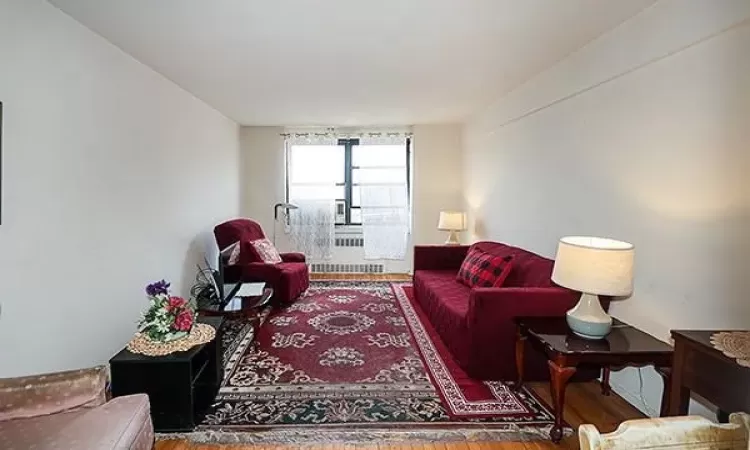 Living area with wood finished floors