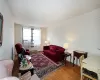 Living area with hardwood / wood-style floors