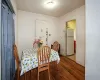 Shared laundry area with washer and dryer and light floors