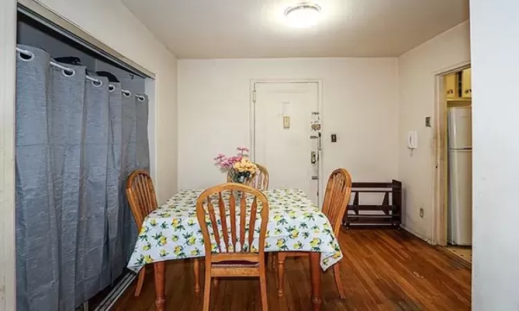 Dining room featuring wood finished floors