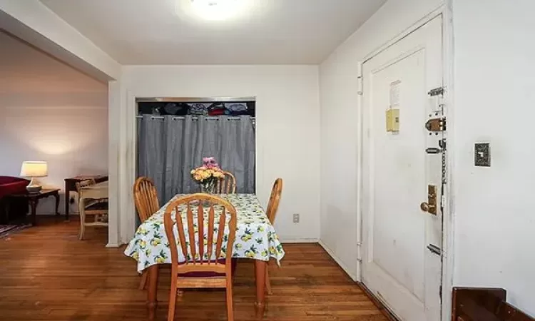 Dining space with wood finished floors