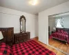 Bedroom with wood finished floors