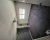 Unfurnished bedroom with visible vents, baseboards, carpet, and a ceiling fan