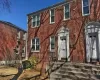 View of front of house with brick siding