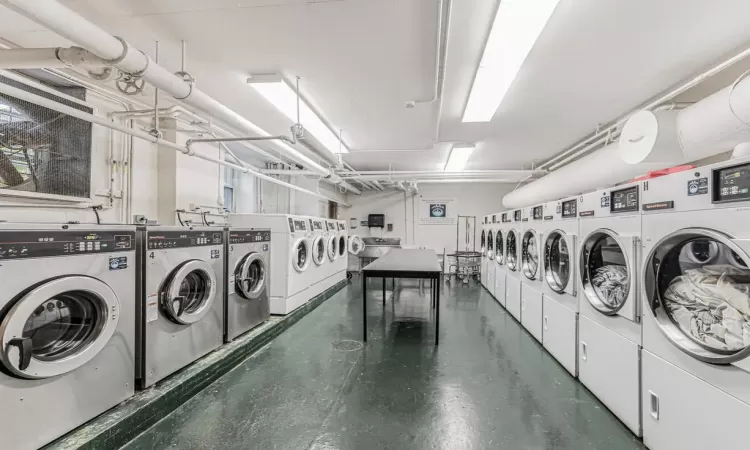 Common laundry area featuring independent washer and dryer