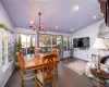 Dining area featuring visible vents, recessed lighting, baseboards, and vaulted ceiling