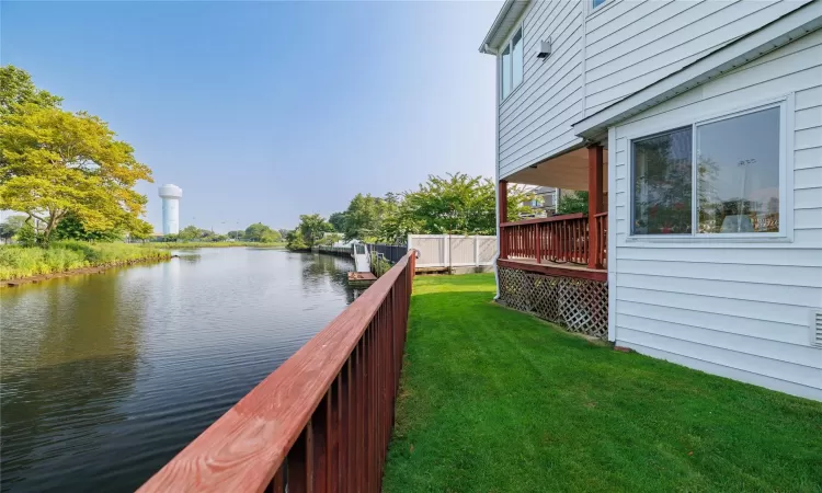 Property view of water with fence