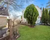 View of yard featuring fence