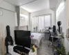 Bedroom featuring light wood-style flooring and radiator heating unit