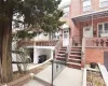 View of exterior entry with brick siding