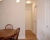 Dining room with baseboards and light wood finished floors