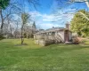 View of yard featuring a wooden deck